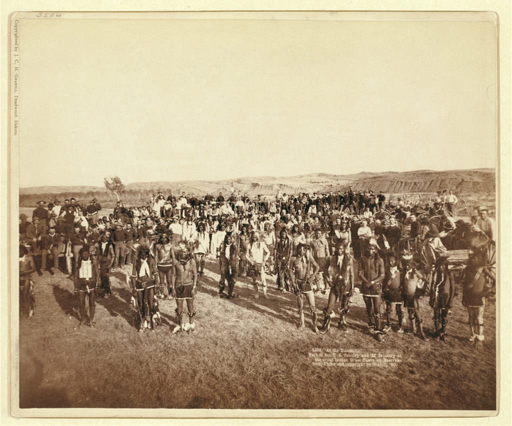 Grabill, John C. H, photographer. At the Dance. Part of the 8th U.S. Cavalry and 3rd Infantry at the great Indian Grass Dance on Reservation. Photograph. Retrieved from the Library of Congress, <www.loc.gov/item/99613793/>.